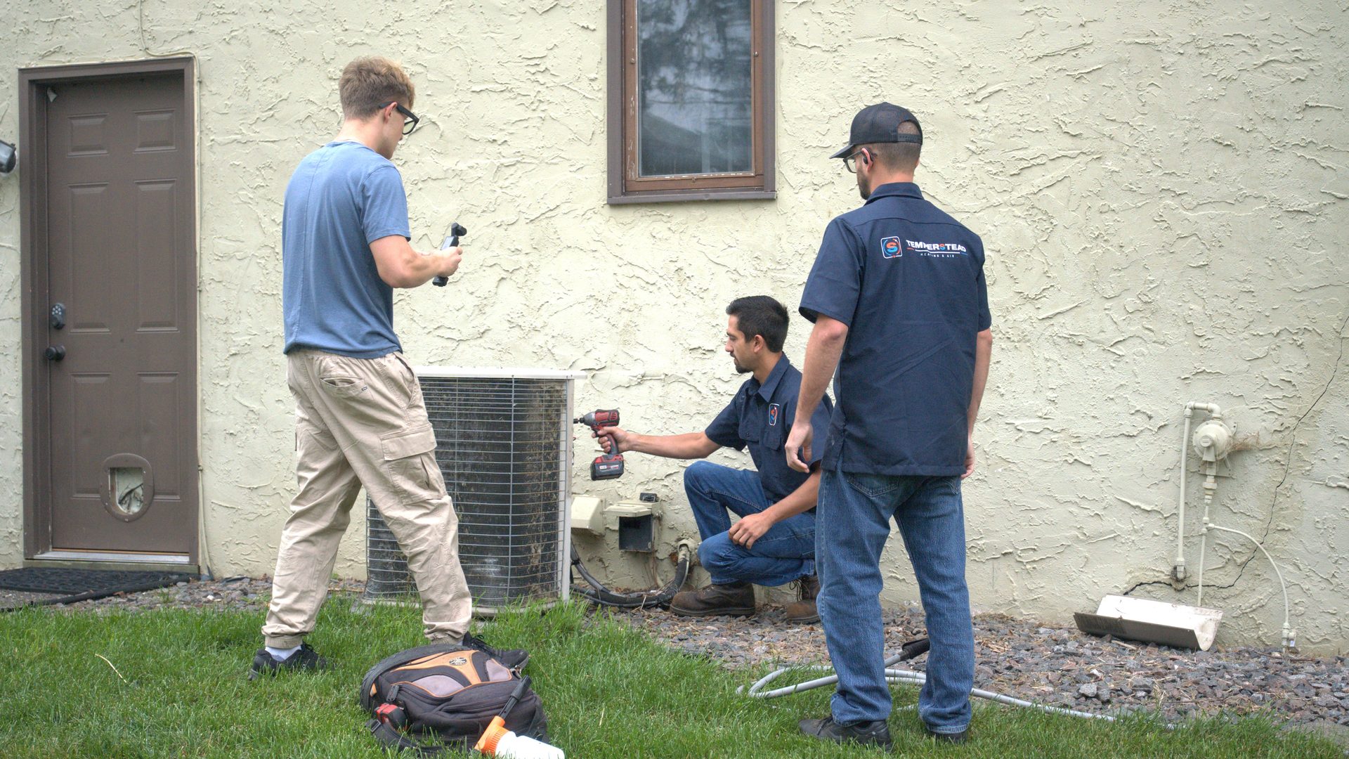 Filming Justin Fodor of Temperstead on a Twin Cities AC job during a Konvyrt content shoot